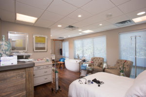 Guest suite of a Baby + Co health and wellness facility architecture by SGA Design Group.