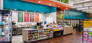 Interior of an Akins Natural Foods grocery store building architecture by SGA Design Group.