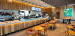 The interior of a Starbucks food service store designed by SGA Design Group.